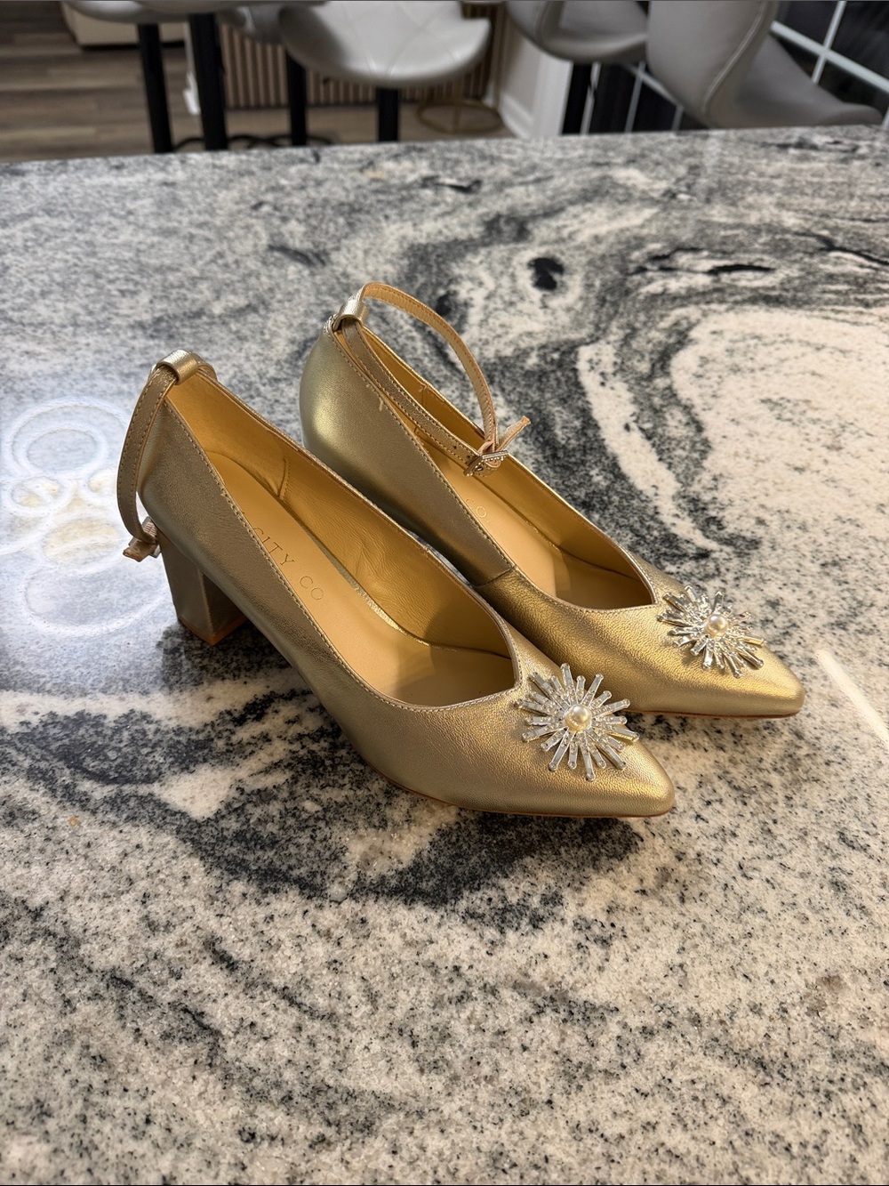 Ivy City Co Gold Pointed Block Heels with Crystal Sunburst